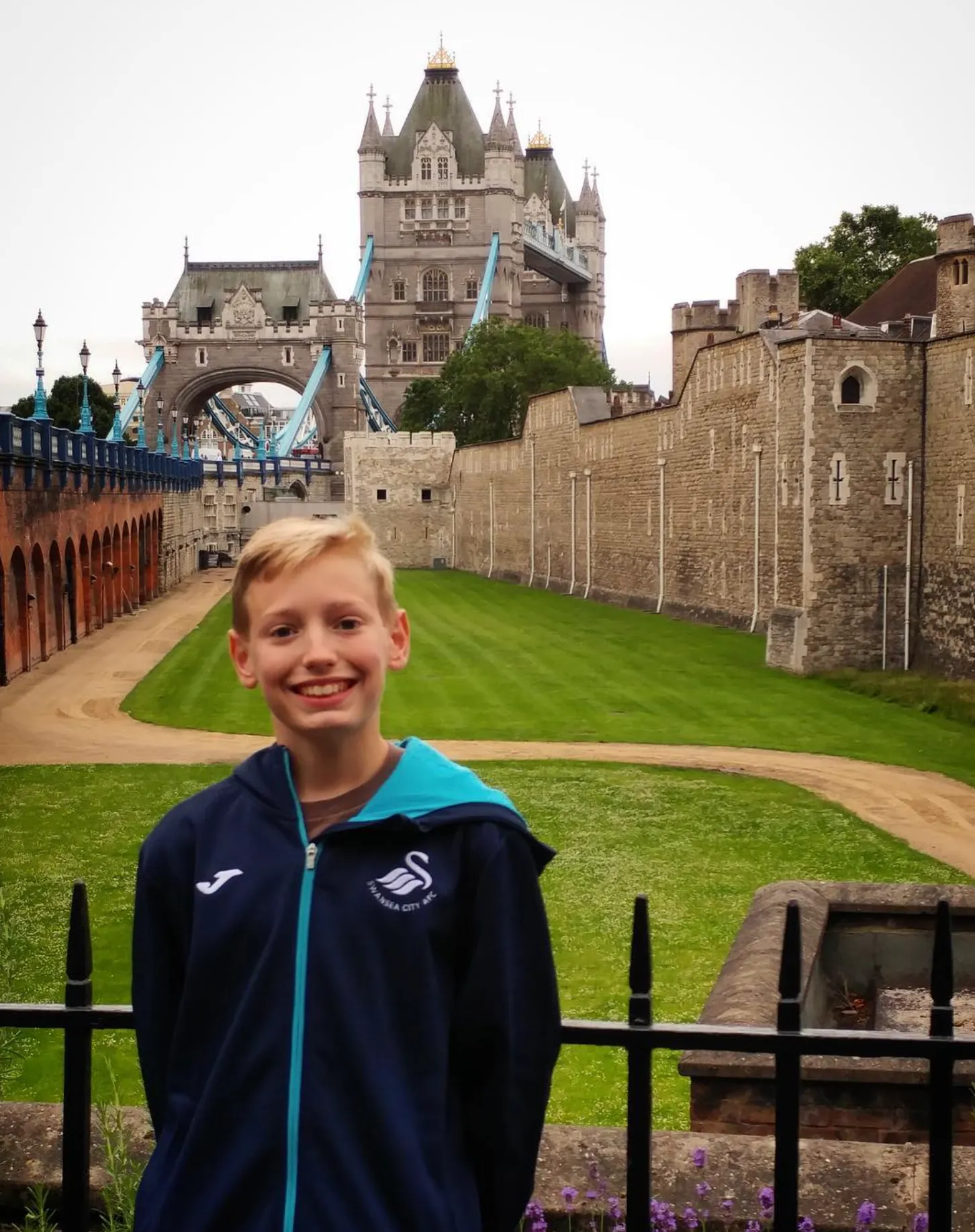 Reece in a Swansea City tracksuit at the Tower of London
